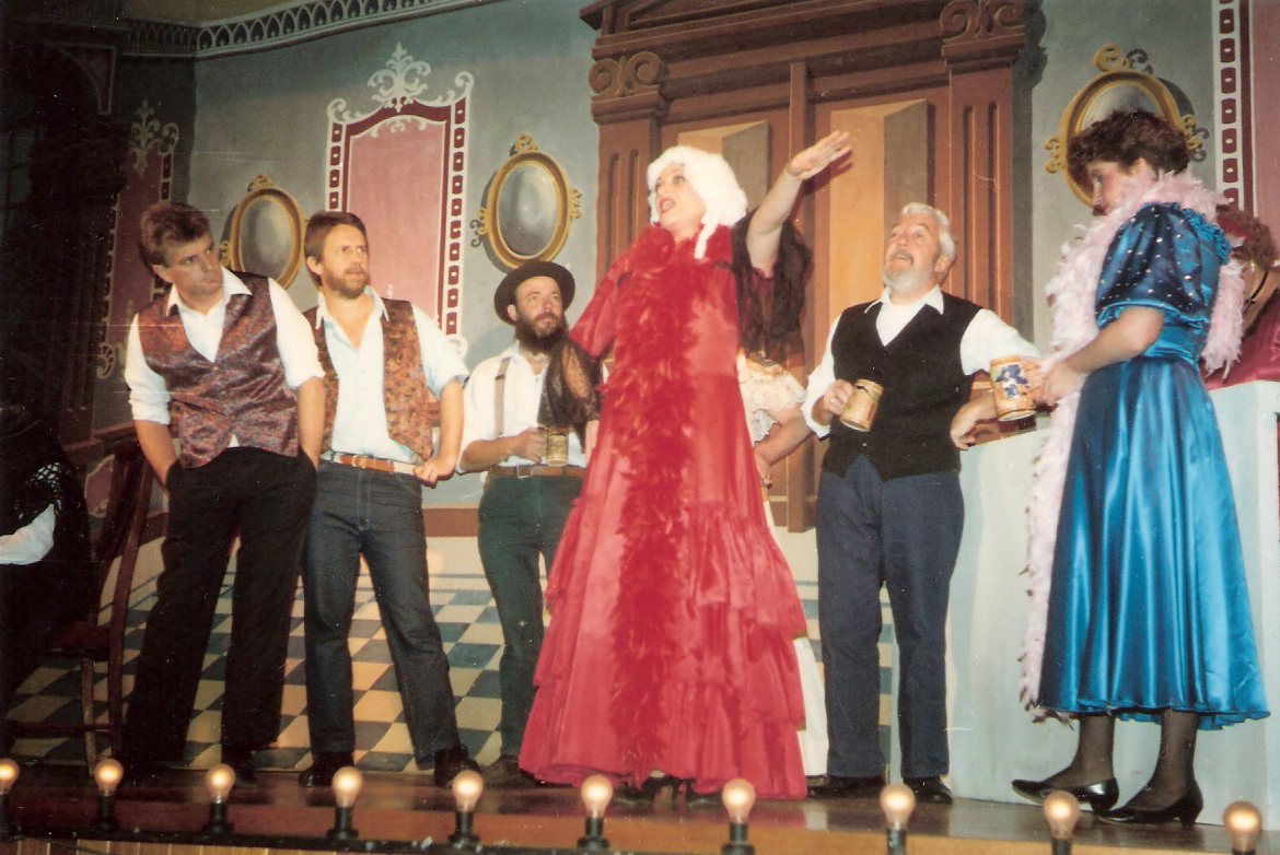 Aviva as Dame Belly Nelba, 1990